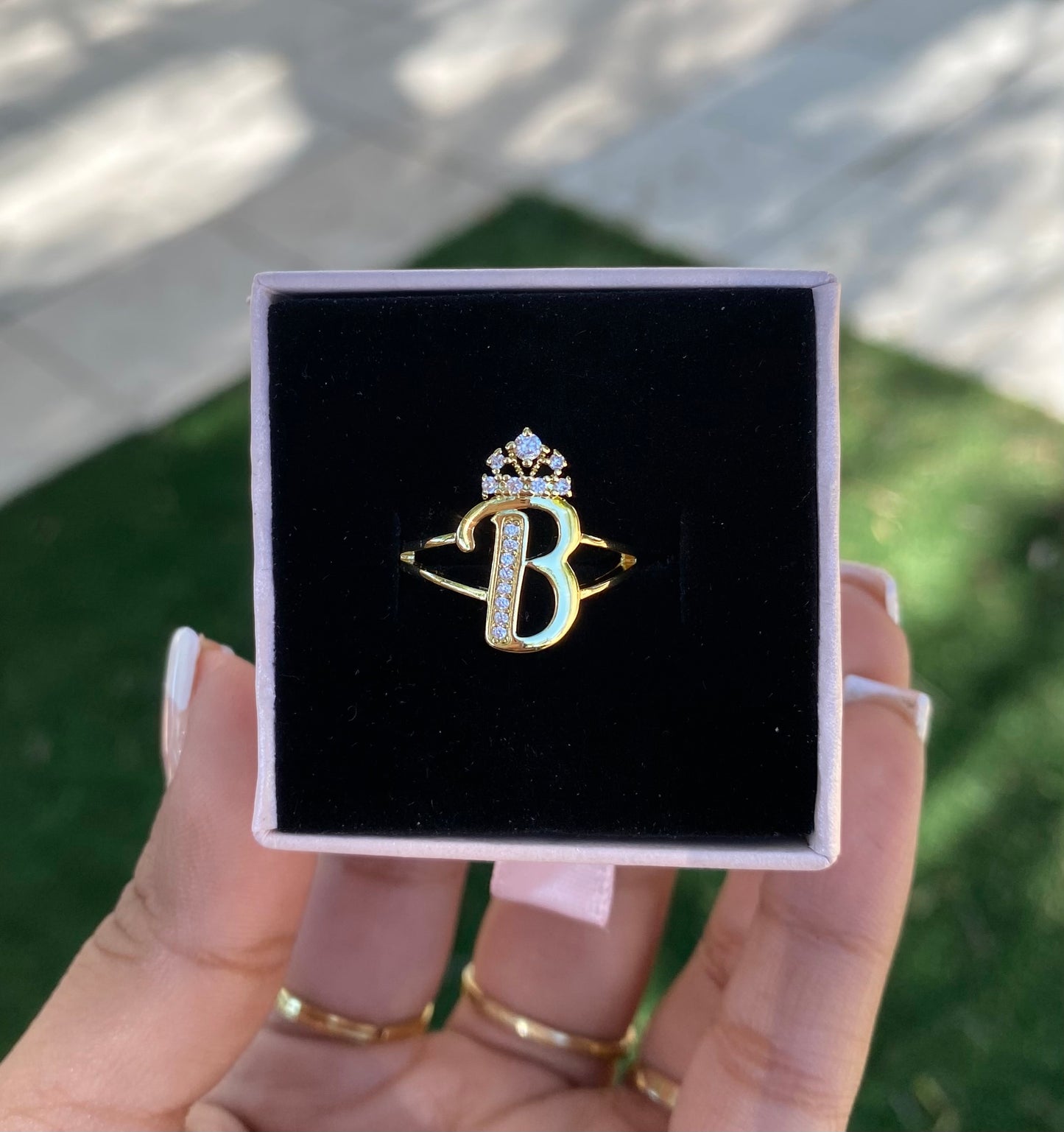 Initial with crown B