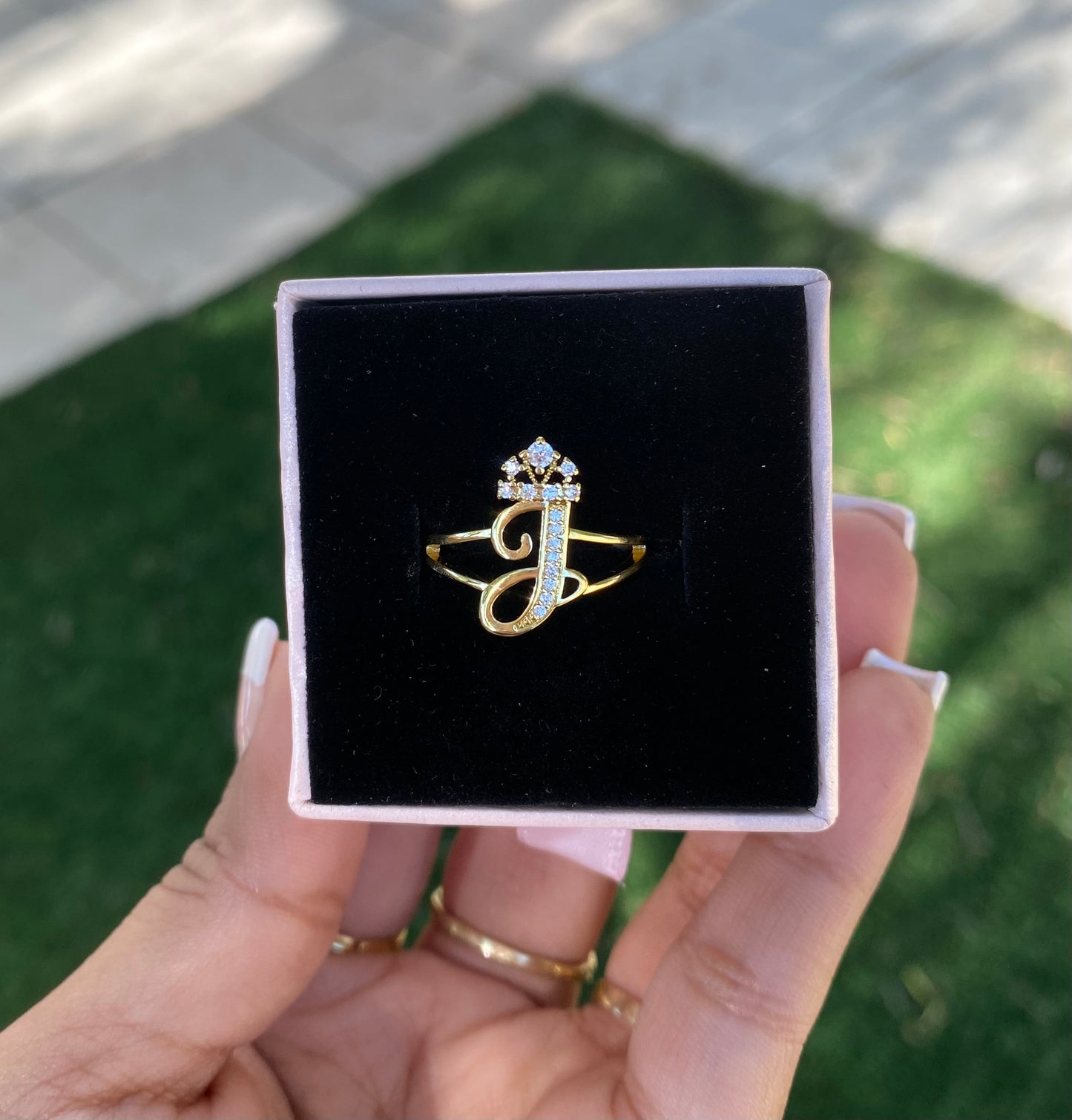 Initial with crown J